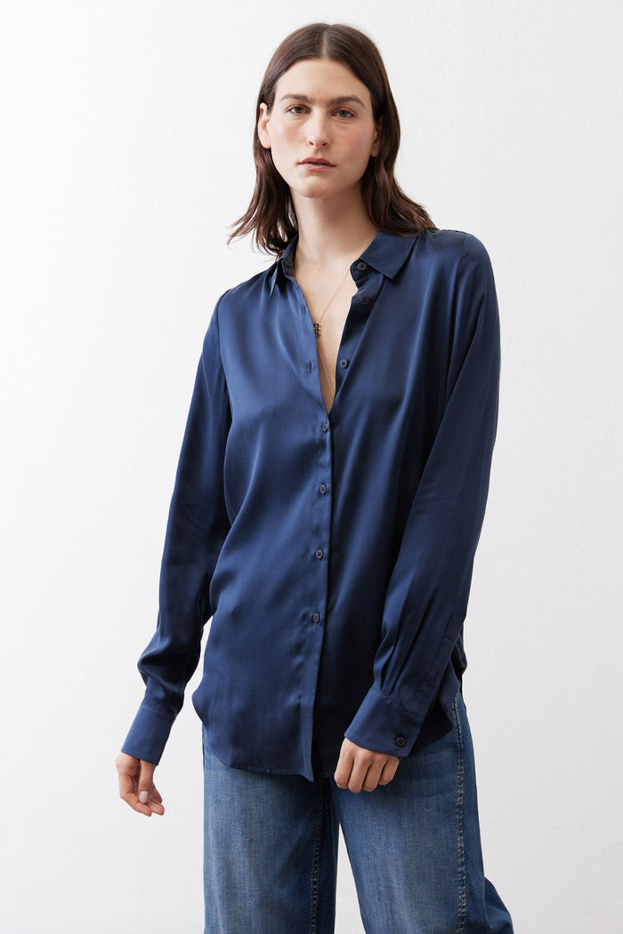 Dark blue silk button-down top front view with button placket and relaxed fit
